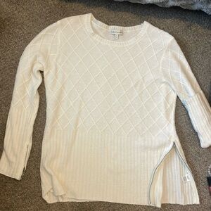 Neiman Marcus white sweater.